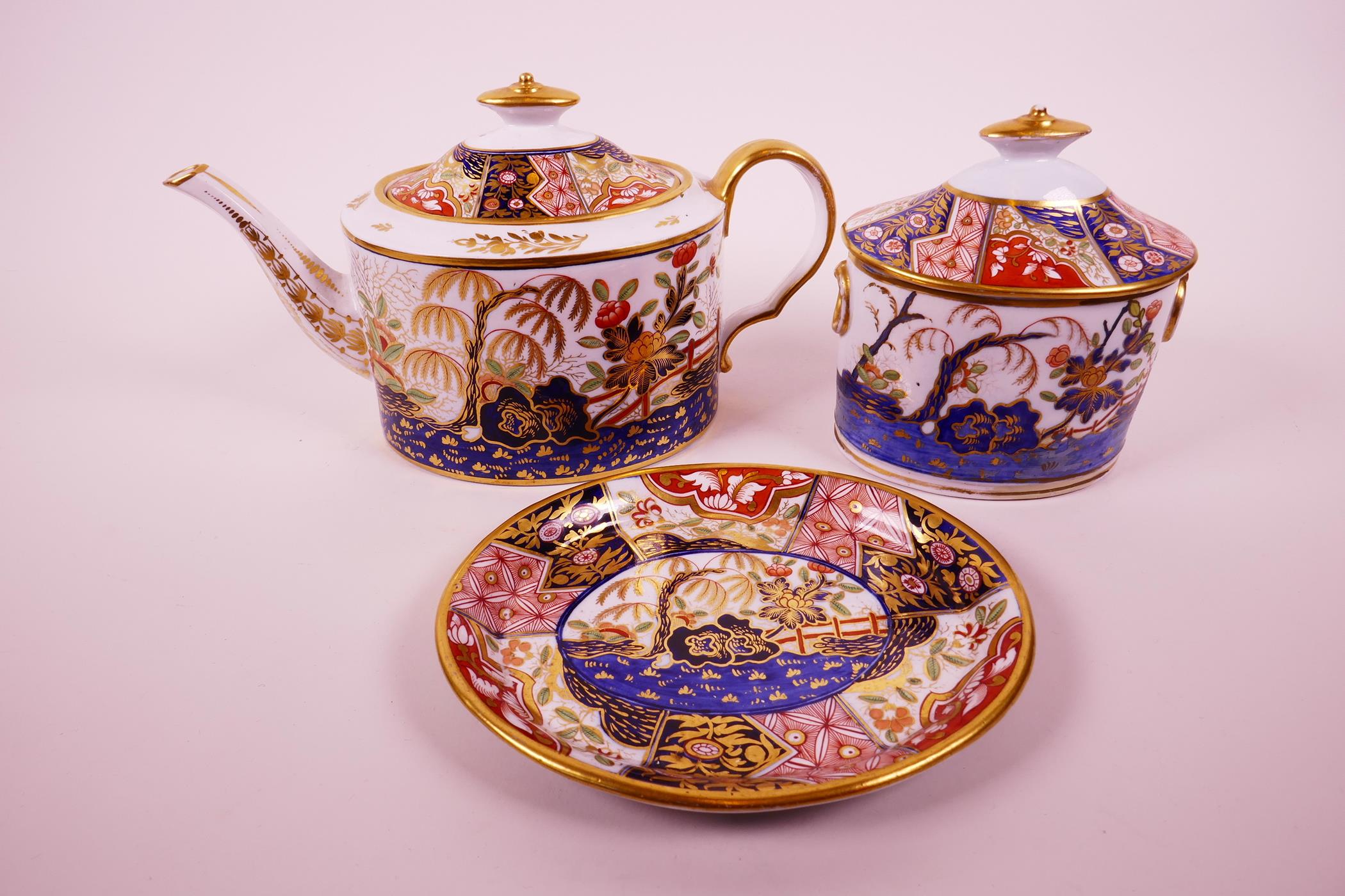 An 'Old Oval' John Rose Coalport teapot and cover, c.1805, with hand painted decoration in the Imari