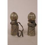 Two Chinese white metal seals with chased and engraved decoration of animals, floral scrolls and
