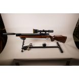 A Webley FX2000 5.5 calibre air rifle, complete with silencer, telescopic sights, bipod and other