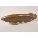 An Oriental brass model of a carp, 17" long