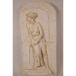 A plaster wall plaque cast as a semi-clad maiden, signed with initials, 21" x 10"