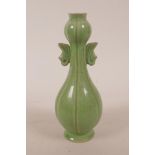 A Chinese green crackle glazed, garlic head shaped vase with two handles, mark to base, 7½" high