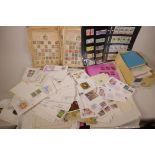 A collection of world stamps including albums, loose sheets and first day covers