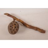 A bamboo root shaker/instrument, 17" long