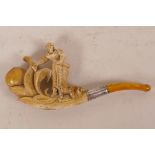 A Meerschaum pipe, the bowl in the form of a female figure standing on leaf stem, 4½" long