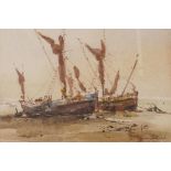 Gerald Edwin Tucker (British, b.1932), 'Fishing Boat Ashore', signed lower right, watercolour, 10" x