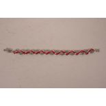 A silver, marcasite and enamel set plaited bracelet, 7½" long