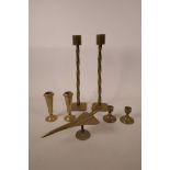 Various brass items, including three hand turned pairs of candlesticks, and a model Concorde, 13"