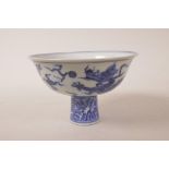 A Chinese blue and white porcelain stem bowl with character inscription to interior and dragon