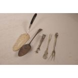 A Thomas Wallis II silver spoon, London 1800, a Continental silver pickle fork and another, an