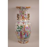 A Chinese famille rose pattern, two handled vase with decorative panels depicting figures in court