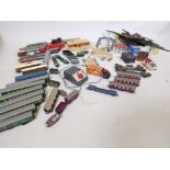 A quantity of Hornby Dublo track, rolling stock, buildings etc, and later Hornby Tri-ang
