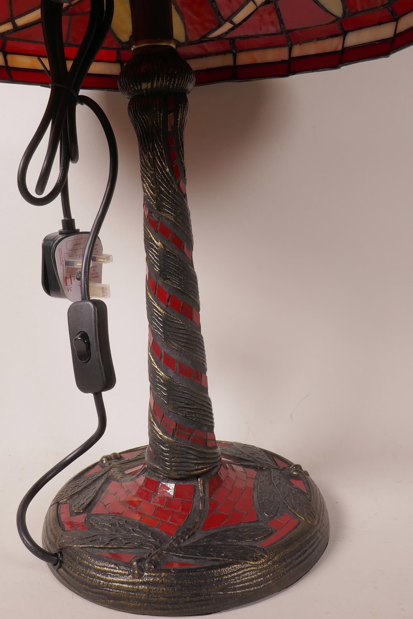 A Tiffany style table lamp with dragonfly decoration on a red ground, 21" high - Image 2 of 3