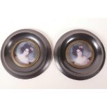 A pair of ebonised miniature frames, aperture 2½" diameter