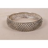 A silver and marcasite set bangle (unmarked), 2½" diameter
