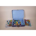 A quantity of Matchbox, Corgi, Dinky etc die cast toy cars, in a Matchbox collector's case, 13" x