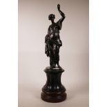 A bronze figure of a maiden with arm held aloft, mounted on a painted wood base with plaque,