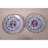 A pair of Spanish Ceramicas de Castro limited edition 'Adam and Eve' porcelain wall plates,