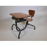 A mid C20th French industrial tubular steel school desk by Jean Prouve, 24½" x 28½", 26½" long at