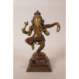 An Indian bronze metal figure of Ganesh, 8½" high