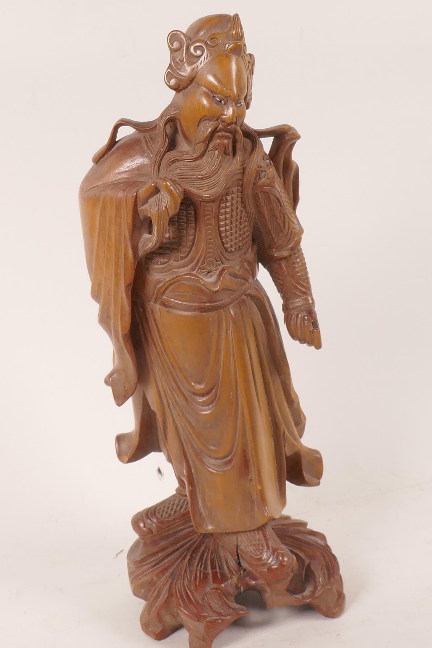 A Chinese carved hardwood figure of a sage with bone and glass eyes, 12" high - Image 2 of 4