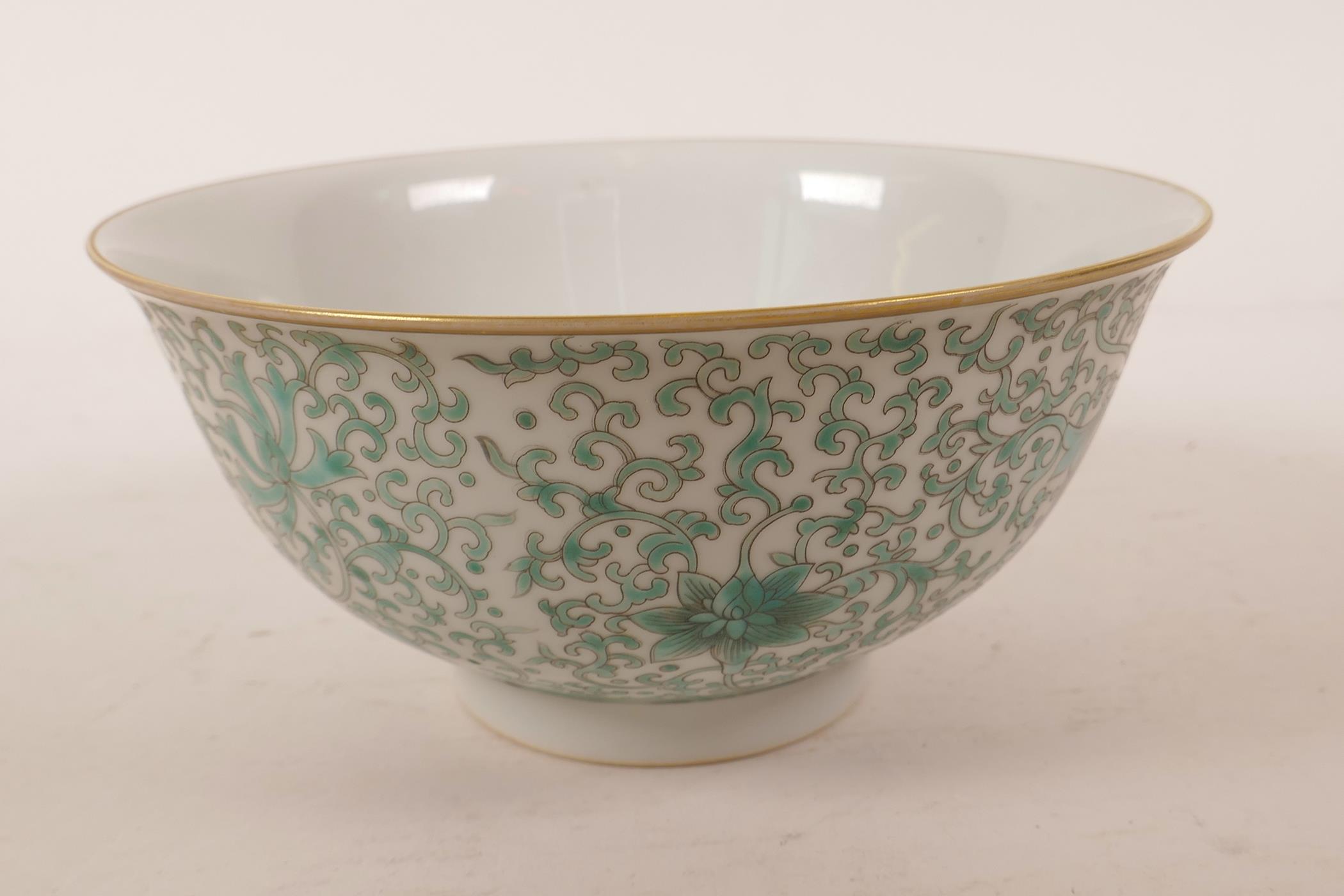 A Chinese porcelain rice bowl with green enamel scrolling lotus flower decoration, 6 character - Image 2 of 4