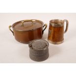 An Inocuivre 8" diameter copper pan; a wooden tankard with silver plated mounts and lining, dated