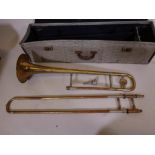 A vintage Boosey and Hawkes Emperor slide trombone in case