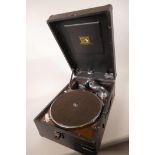 An HMV picnic gramophone in black case, handle missing, 11" x 16" x 7"