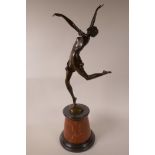 An Art Deco style bronze figurine of a dancer on a marble base, 25" high