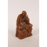 A Chinese boxwood carving of Lohan, 5" high