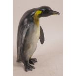 A cold painted metal figurine of a penguin, 7½" high