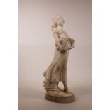 A late C19th/early C20th alabaster figure of a woman bearing a basket of grapes, 17" high