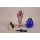 An Art Deco style glass perfume bottle, and two other art glass perfume bottles, both signed,