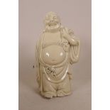 A Chinese blanc de chine of Buddha, impressed marks verso, 6½" high