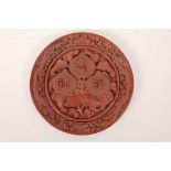 A Chinese Cinnabar lacquer style dish decorated with peaches, auspicious characters and dragons, 4