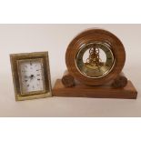A bedroom clock with 925 silver frame front, 5" x 4", together with a teak cased skeleton clock with