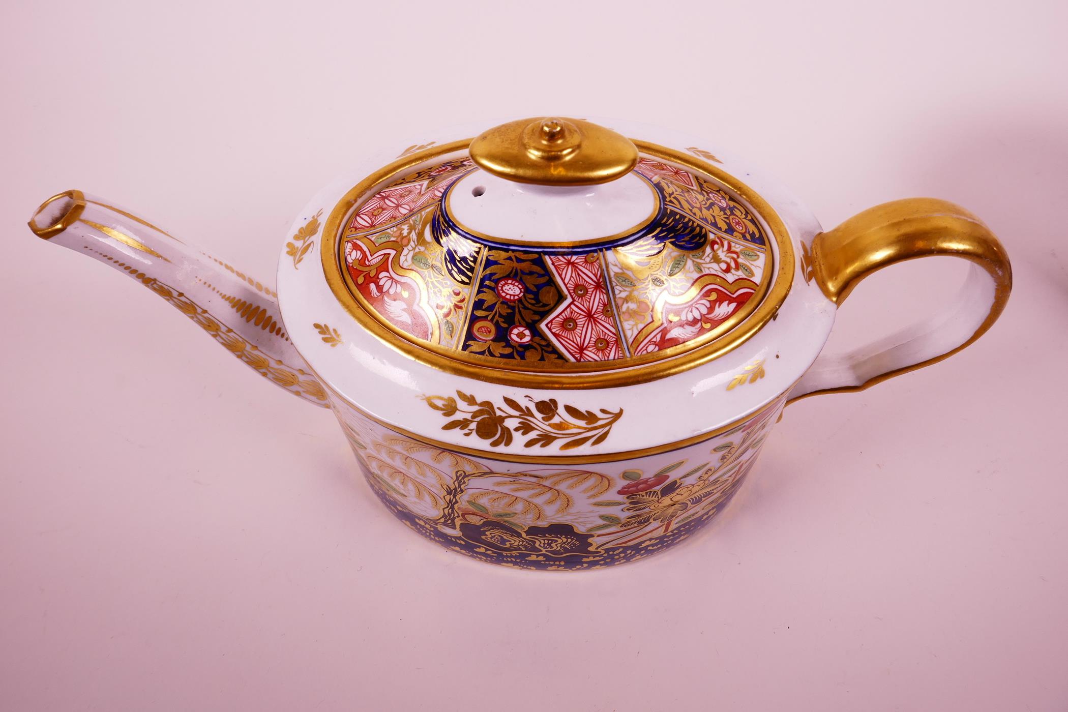 An 'Old Oval' John Rose Coalport teapot and cover, c.1805, with hand painted decoration in the Imari - Image 6 of 9