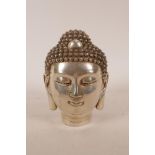 A Chinese filled and silvered metal Buddha head, impressed 4 character mark to base, 6½" high