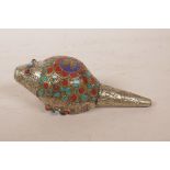 A Tibetan white metal and brass mounted conch shell, set with semi-precious stones and decorated