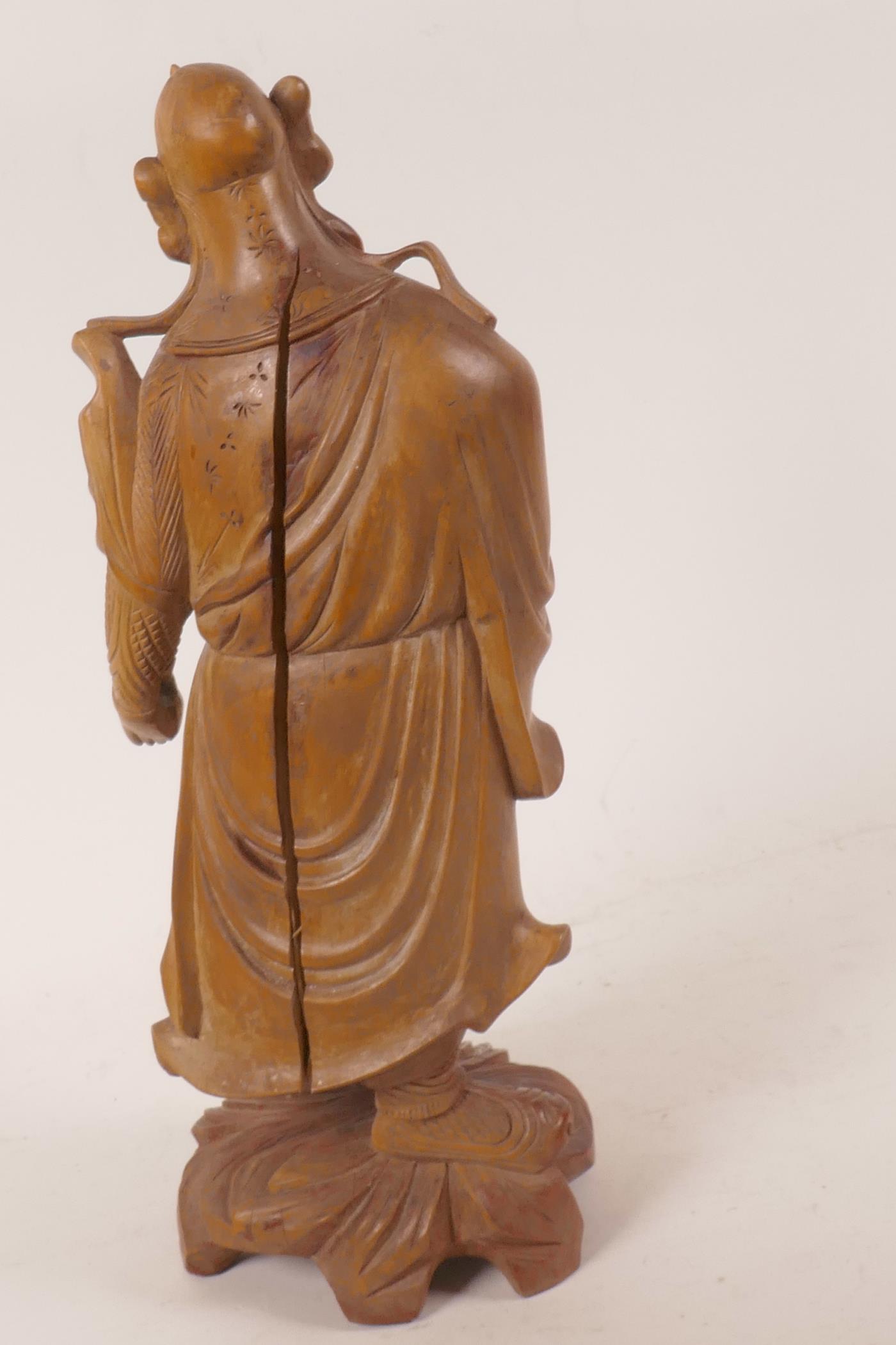 A Chinese carved hardwood figure of a sage with bone and glass eyes, 12" high - Image 4 of 4