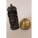 An Indian carved ebony figurine of Ganesh seated on a throne, 5½" high, together with a brass