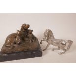 A bronze figurine of a dog with two kittens, 6" long, together with a plated cast metal figurine