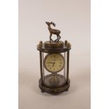 A bronze desk clock with a stag mount, 5½" high