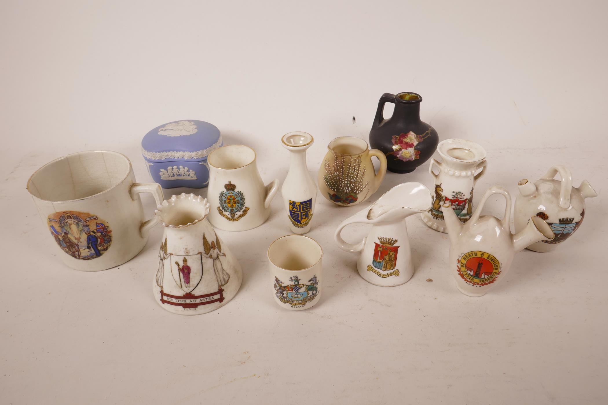 A variety of porcelain items including crested ware, a Wedgwood Jasperware pot and an unusual WW1