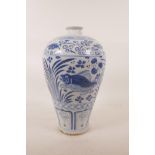 A Chinese Ming style blue and white pottery meiping vase decorated with carp in a lotus pond, 12"