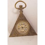 A brass cased pocket watch decorated with Masonic symbols, 2" x 2¾"