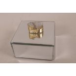 A small mirrored glass jewellery box, 4¼" x 4¼" x 2¼"