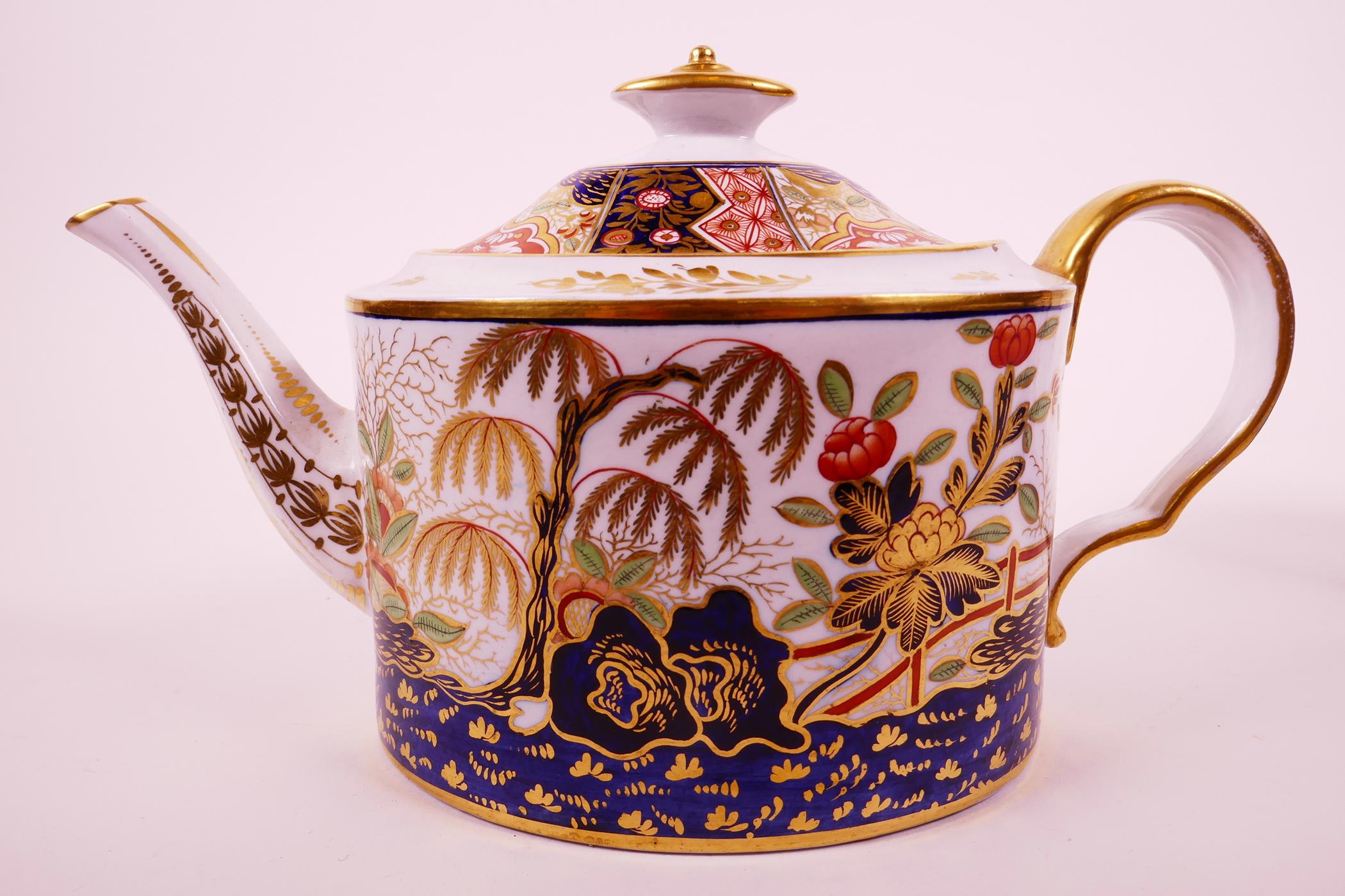 An 'Old Oval' John Rose Coalport teapot and cover, c.1805, with hand painted decoration in the Imari - Image 5 of 9
