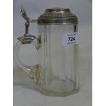 A C19th German cut glass half litre tankard with silver mount and cover, marked 800, by Koch and